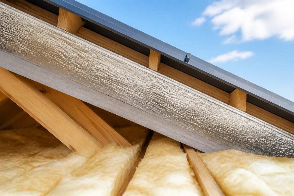 Roof Insulation Guide 2026 | R-Values, Types & Installation